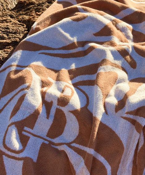 Swirl Beach Towel Wonder Clarifying Serum