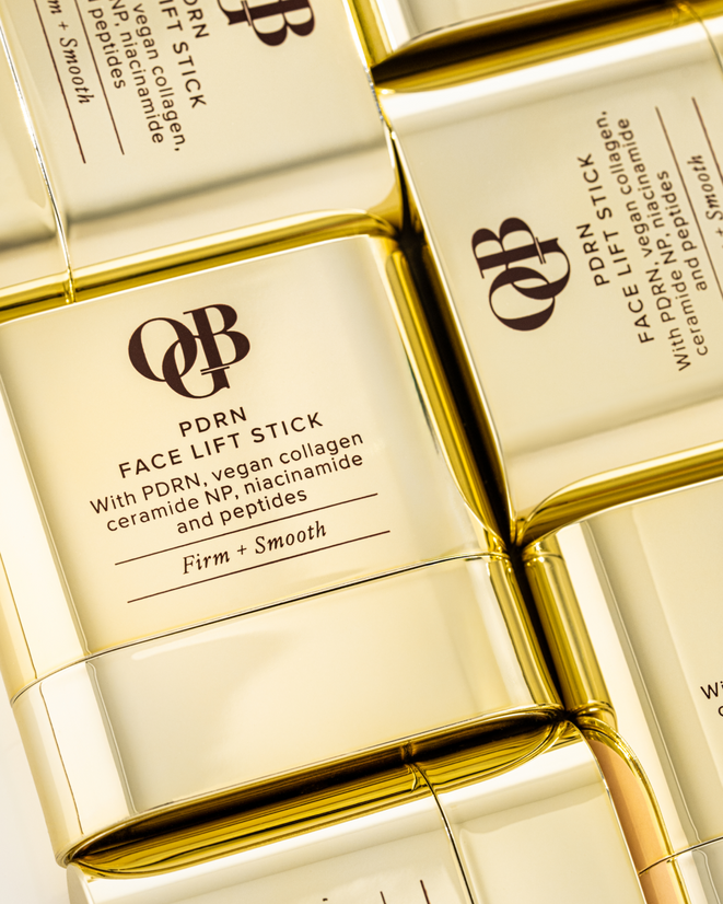 OGB All Things PDRN Set: close-up of gold PDRN Face Lift Stick packaging