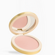 An open round makeup compact with a gold-toned case and a light pink pressed powder, shown on a clean white background.