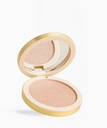 An open round makeup compact with a gold-tone case, showing a shimmering light peach-beige pressed powder and a mirror on the inside of the lid, set against a clean white background.